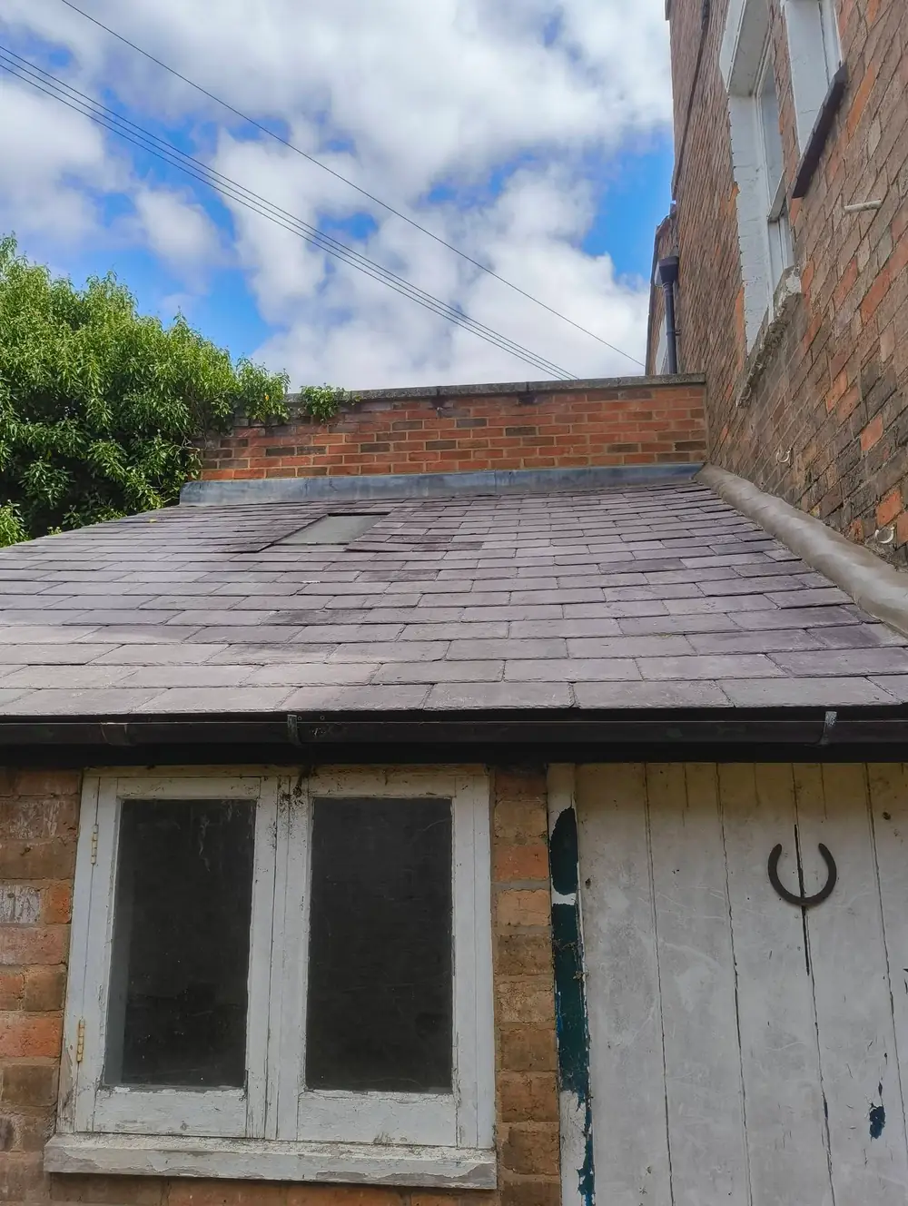 Re-slated outbuilding roof
